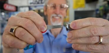Diamond Locksmith expert locksmith Rod holding a key