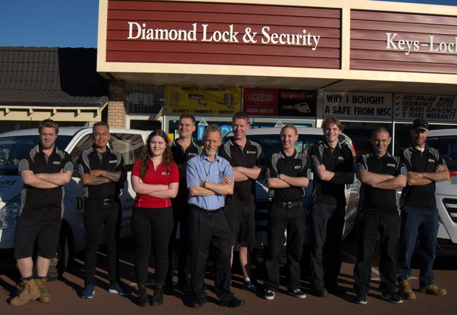 A team of locksmiths standing out the front of Diamond Lock and Security office and workshop.