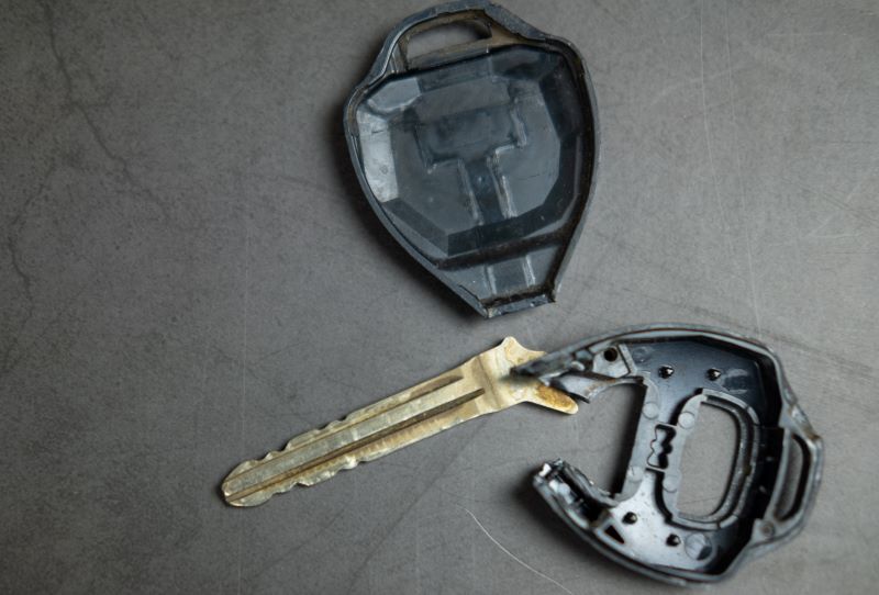 Close up of damaged car key.